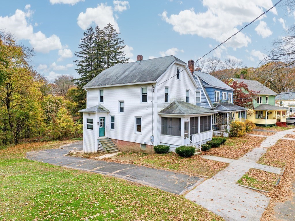 104 Eleanor Road Springfield, MA 01108 - Photo 4 of 33 a front view of a house with a yard