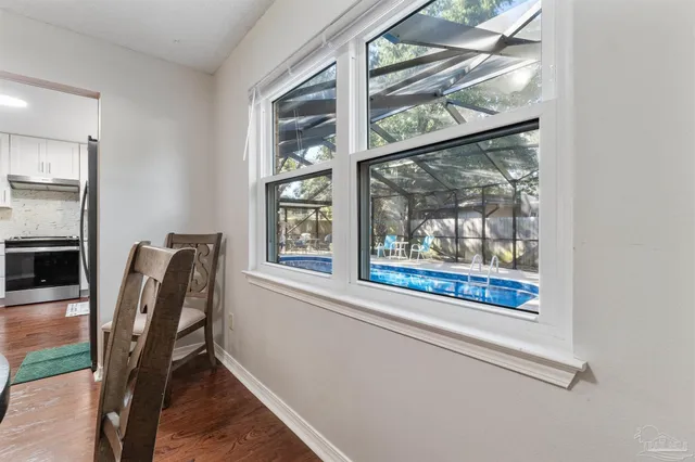 a view of livingroom with furniture and window