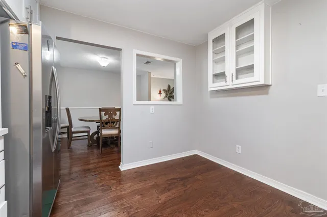 a kitchen with a stove and a sink