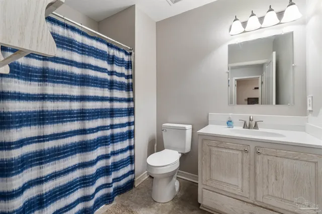 a view of balcony with wooden floor