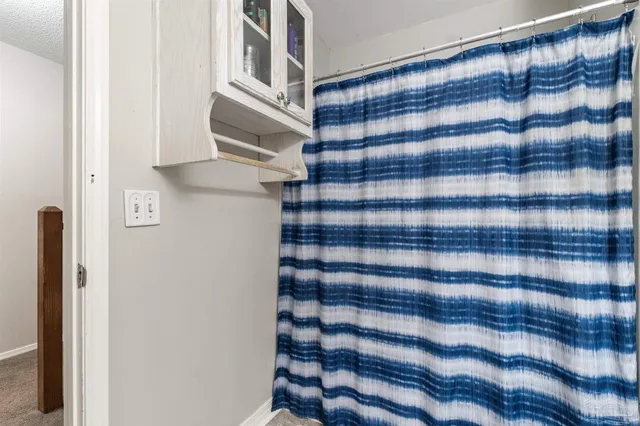 a view of a chairs and table in the patio