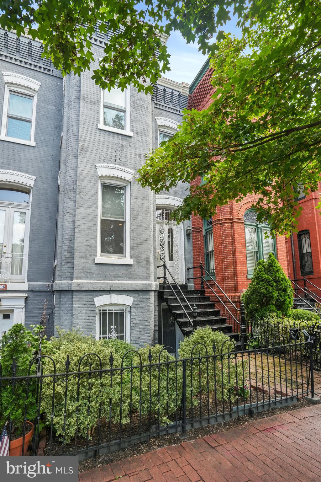 628 A Street Northeast Washington, DC 20002 - Photo 1 of 29 front view of a house with a garden
