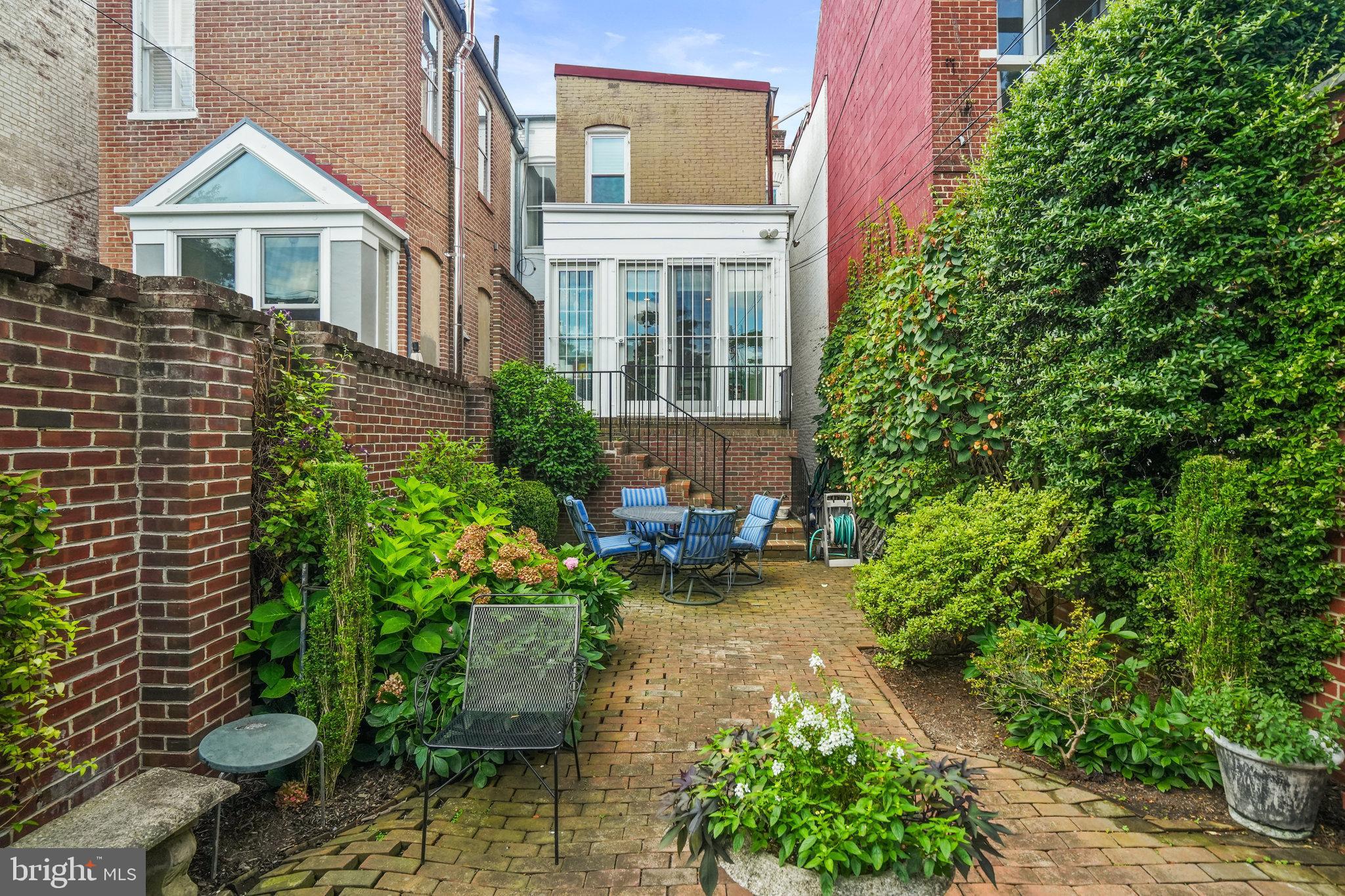 628 A Street Northeast Washington, DC 20002 - Photo 12 of 29 a front view of a house with a yard