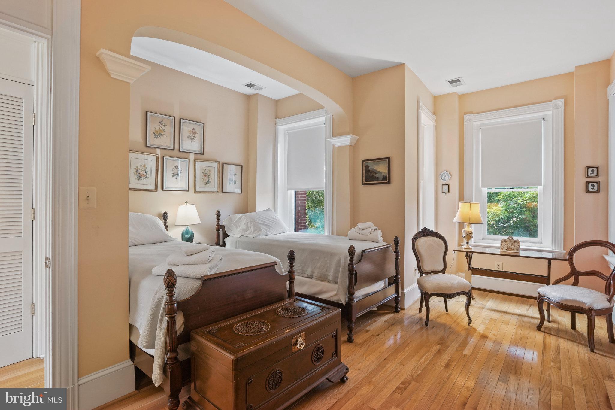 628 A Street Northeast Washington, DC 20002 - Photo 15 of 29 a bedroom with furniture and a wooden floor