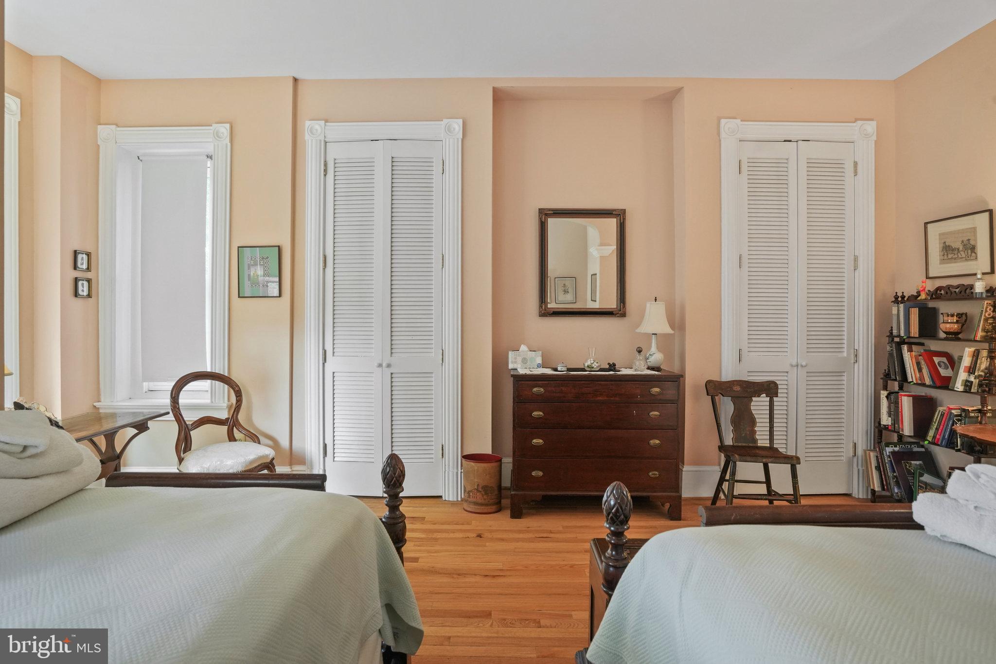 628 A Street Northeast Washington, DC 20002 - Photo 16 of 29 a bedroom with furniture and a dresser