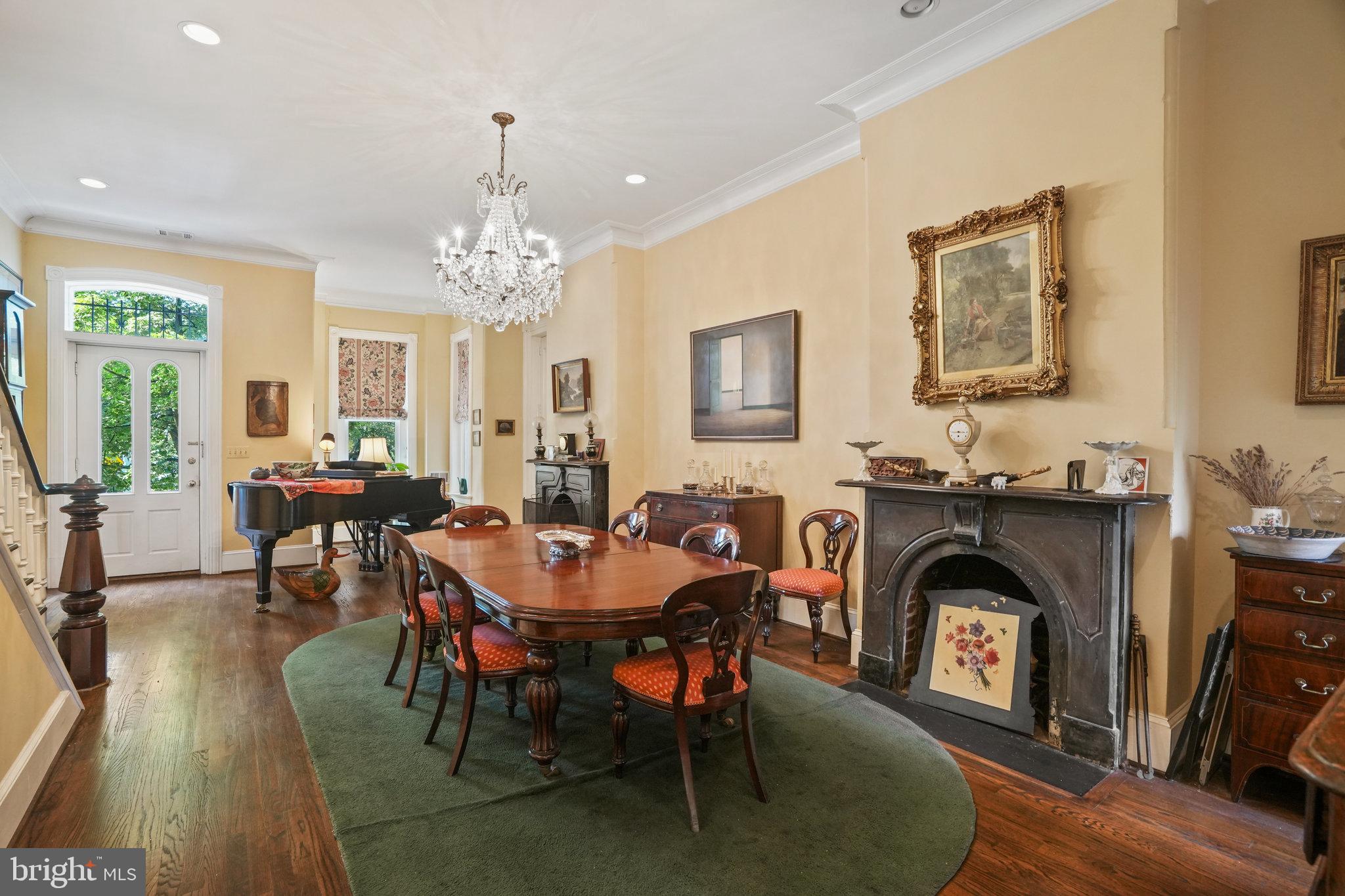 628 A Street Northeast Washington, DC 20002 - Photo 4 of 29 a view of a dining room with furniture window and wooden floor