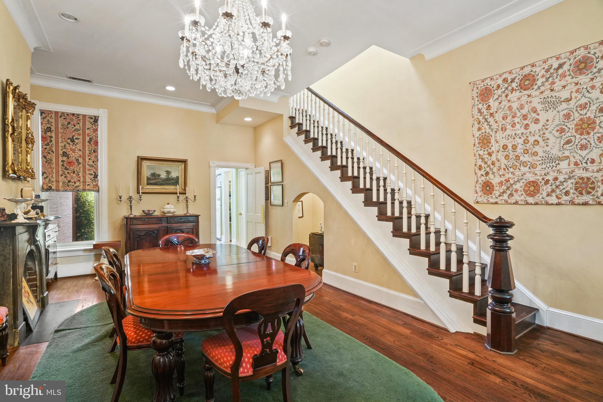628 A Street Northeast Washington, DC 20002 - Photo 5 of 29 a view of a dining room with furniture a chandelier and wooden floor