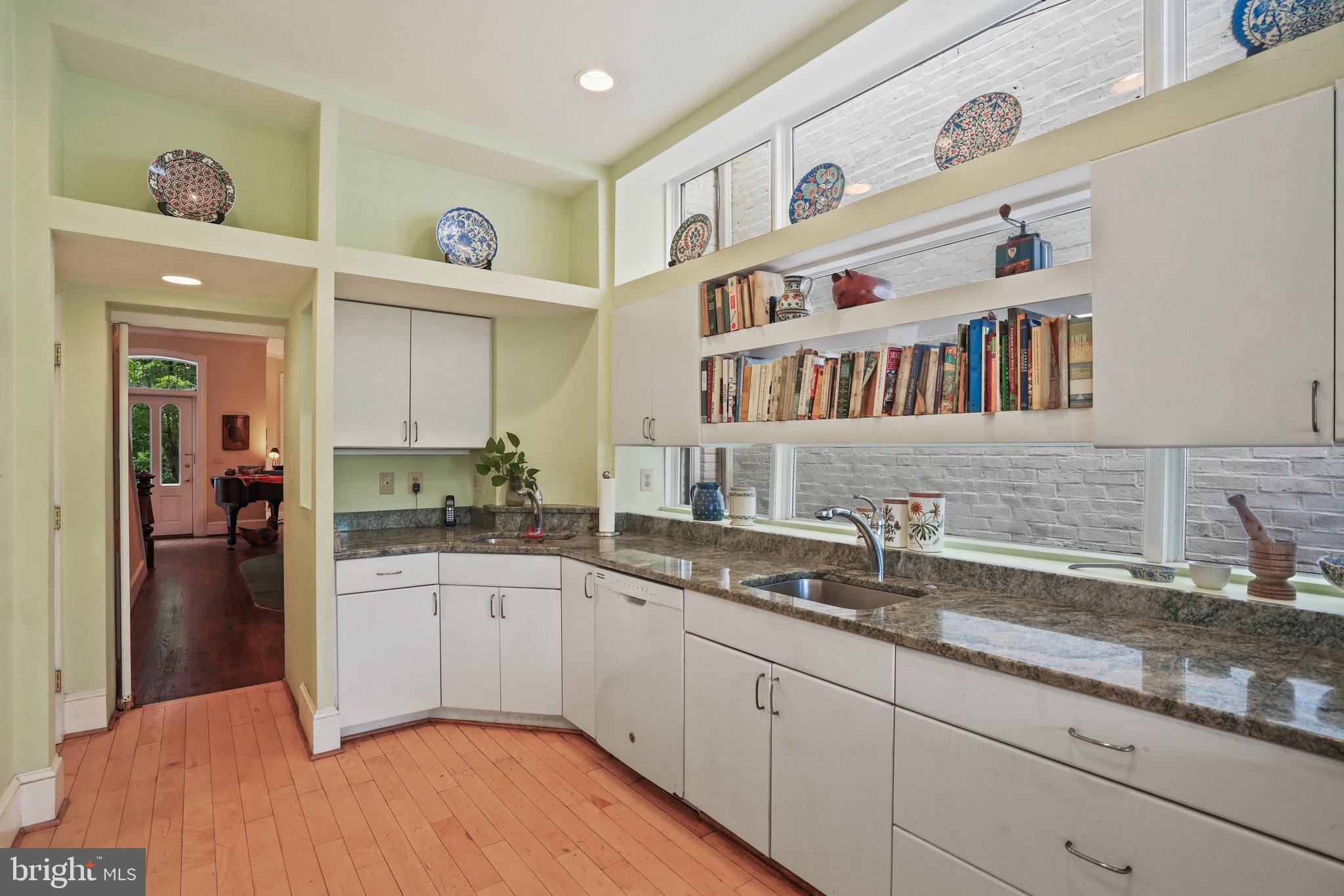 628 A Street Northeast Washington, DC 20002 - Photo 7 of 29 a kitchen with a sink cabinets and appliances