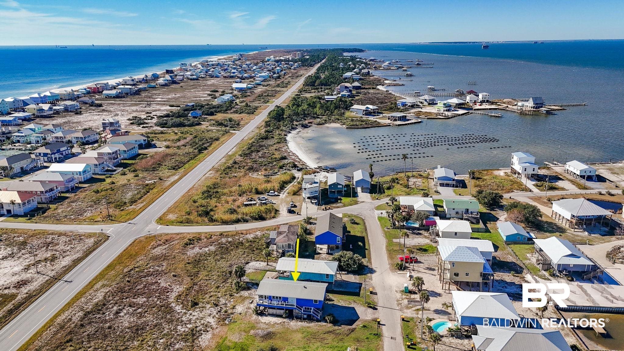 2514 Muscogee Road Gulf Shores, AL 36542 - Photo 56 of 60 Aerial view featuring a water view