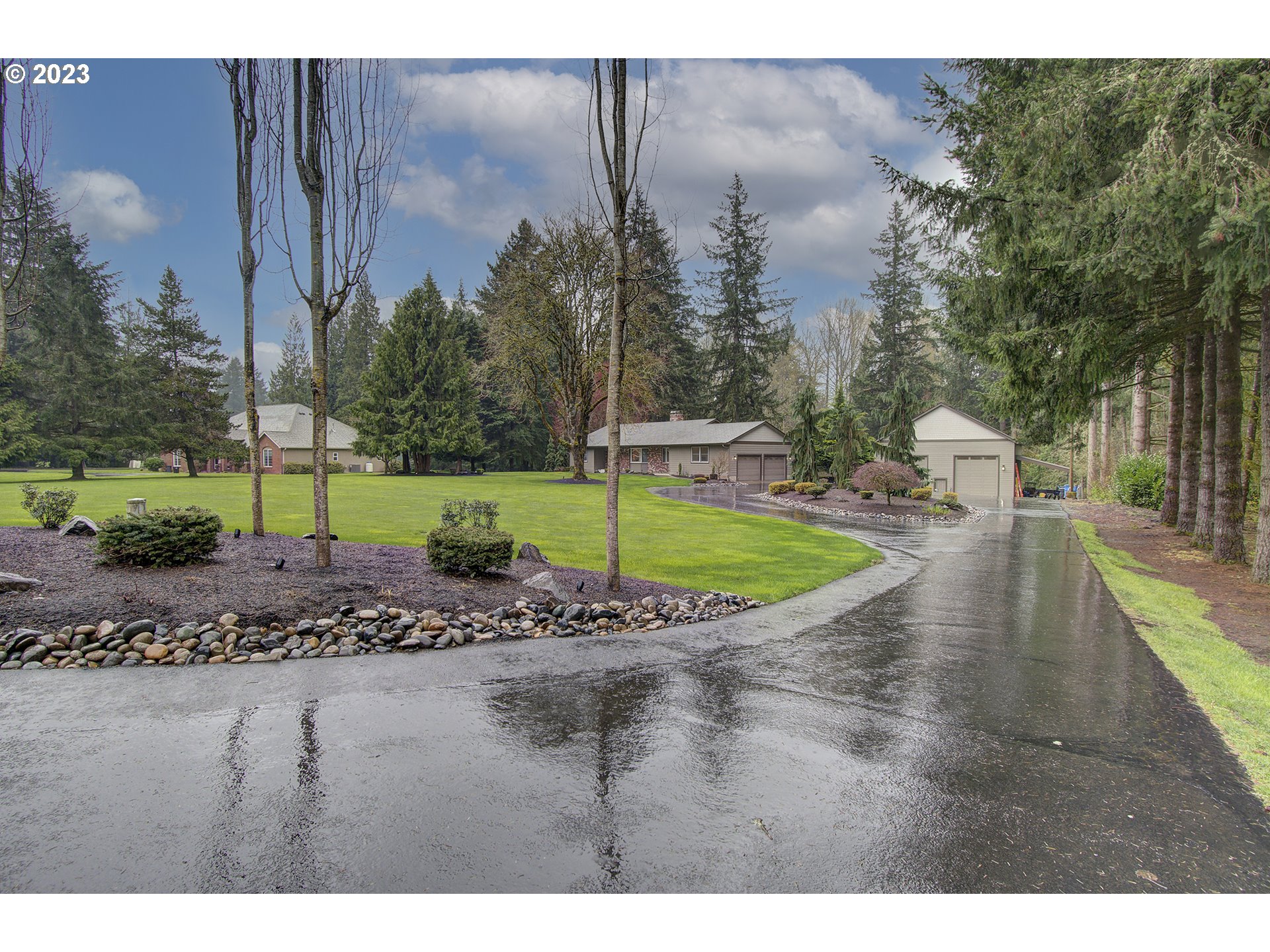 a view of a backyard with green space