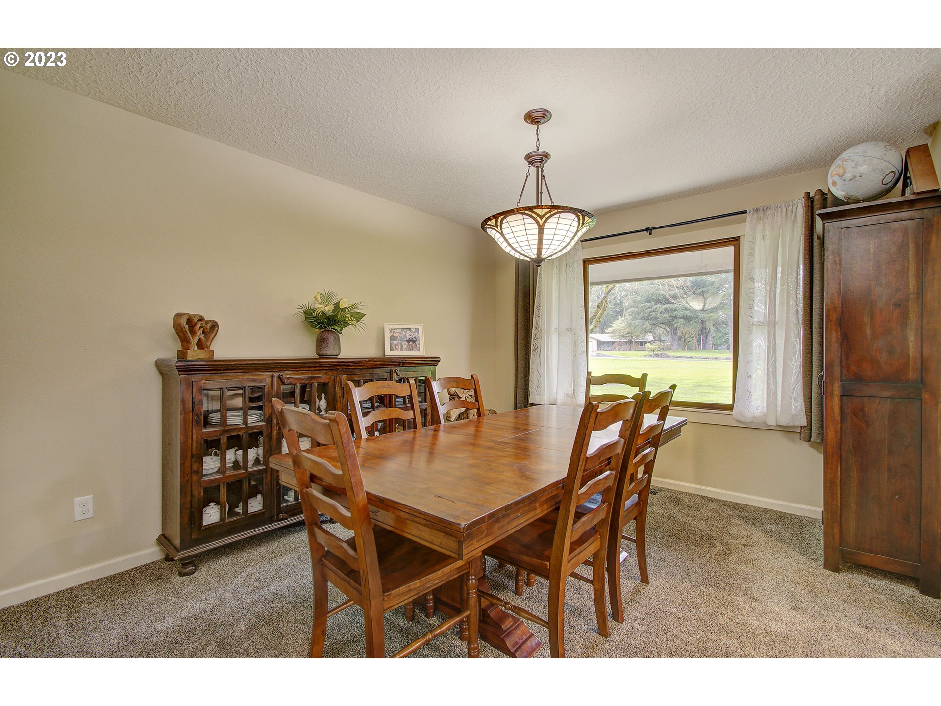 13025 Northeast Prairie Road Brush Prairie, WA 98606 - Photo 15 of 47 a dining room with furniture and window