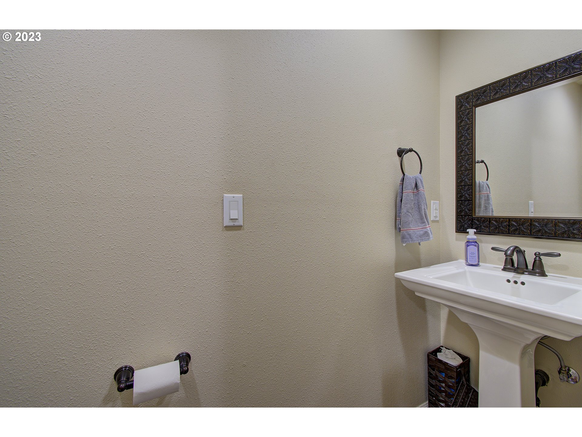 13025 Northeast Prairie Road Brush Prairie, WA 98606 - Photo 17 of 47 a bathroom with a sink and a mirror