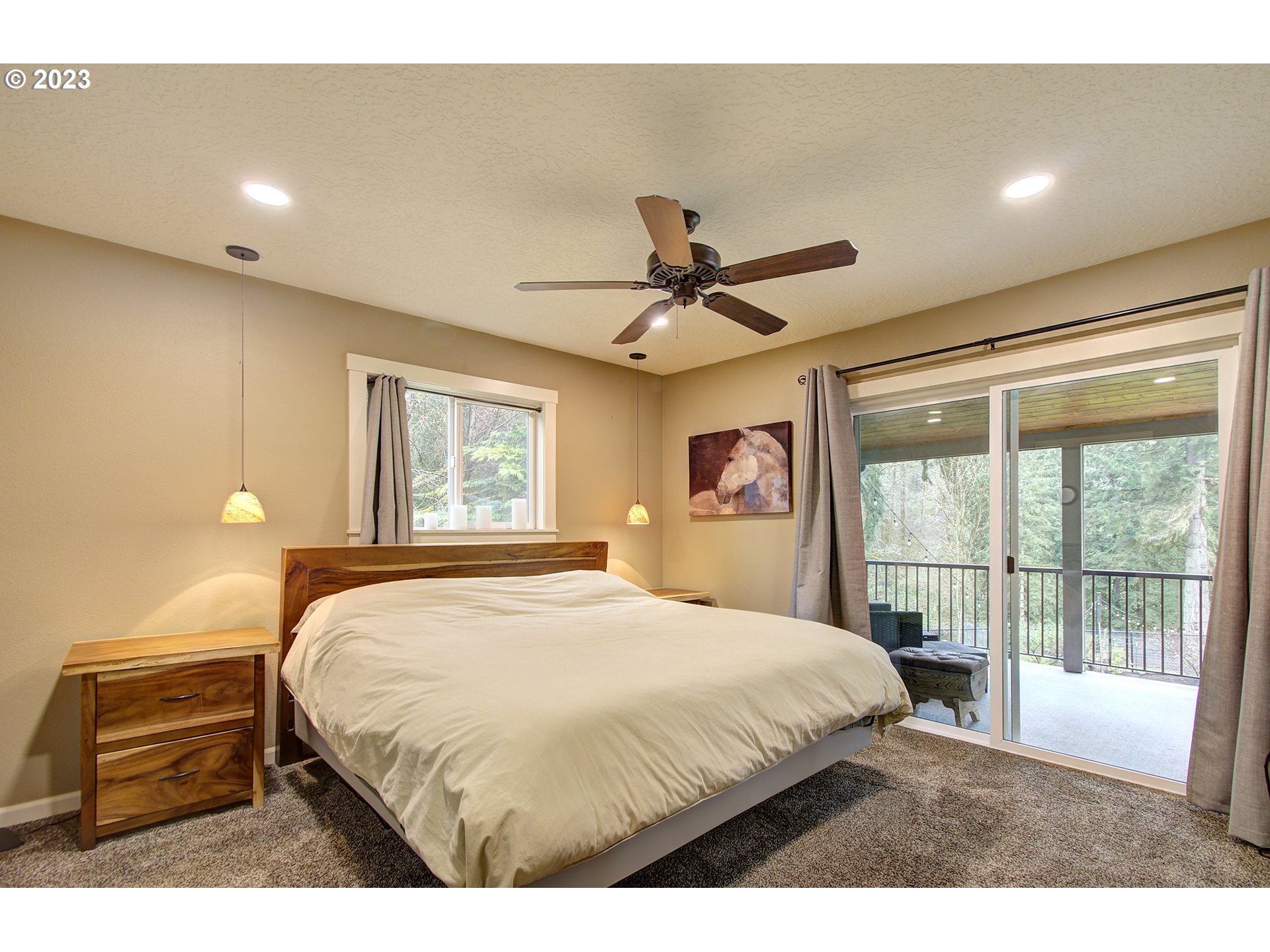 13025 Northeast Prairie Road Brush Prairie, WA 98606 - Photo 18 of 47 a bedroom with a large bed and a window