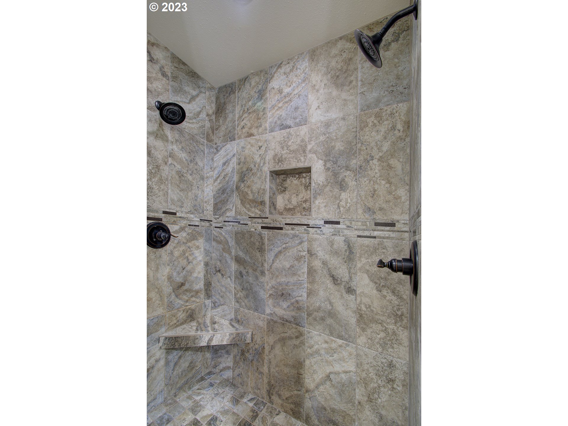 13025 Northeast Prairie Road Brush Prairie, WA 98606 - Photo 22 of 47 a picture of a bathroom with a shower curtain