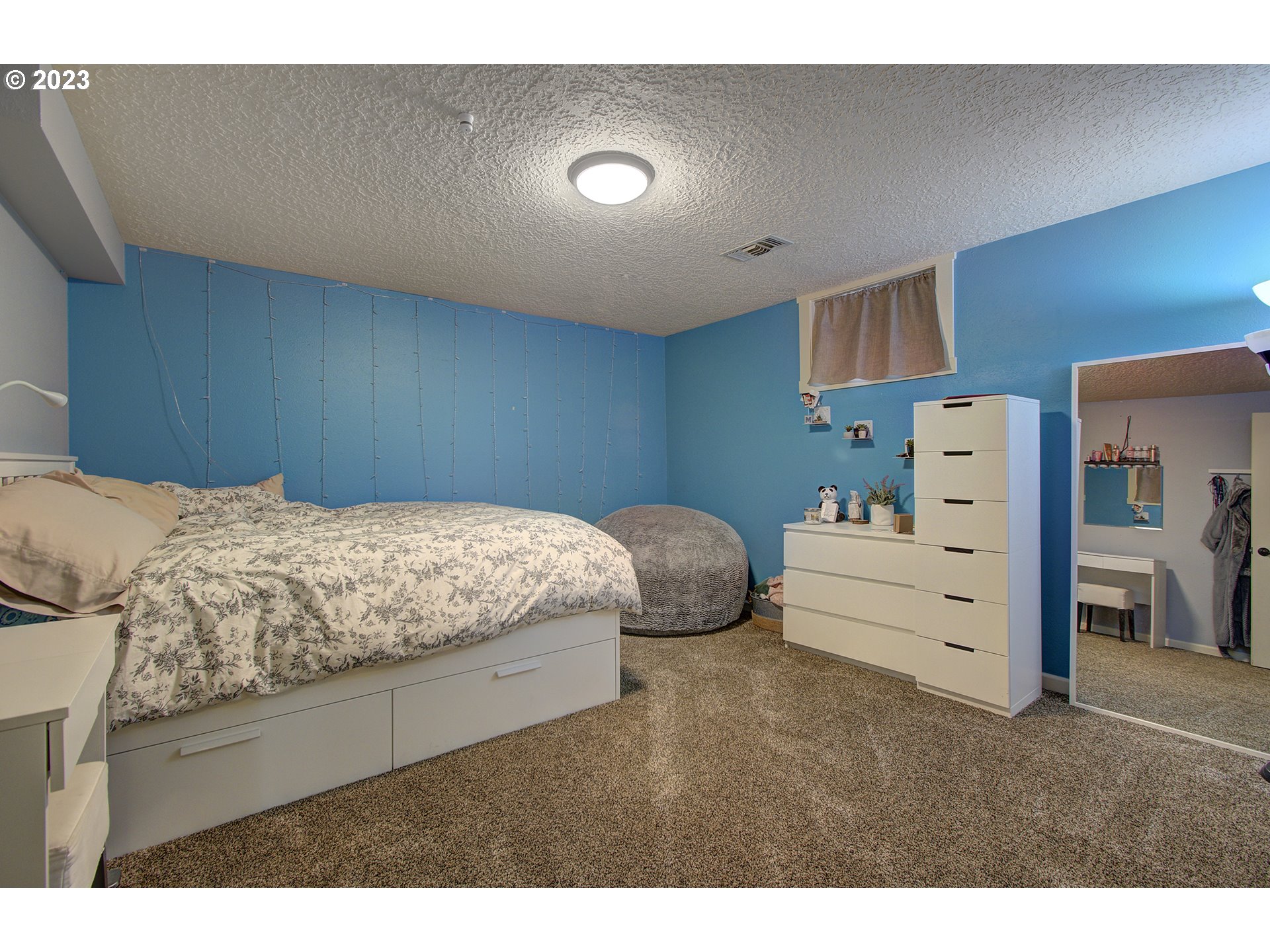 13025 Northeast Prairie Road Brush Prairie, WA 98606 - Photo 28 of 47 a bedroom with a bed and furniture
