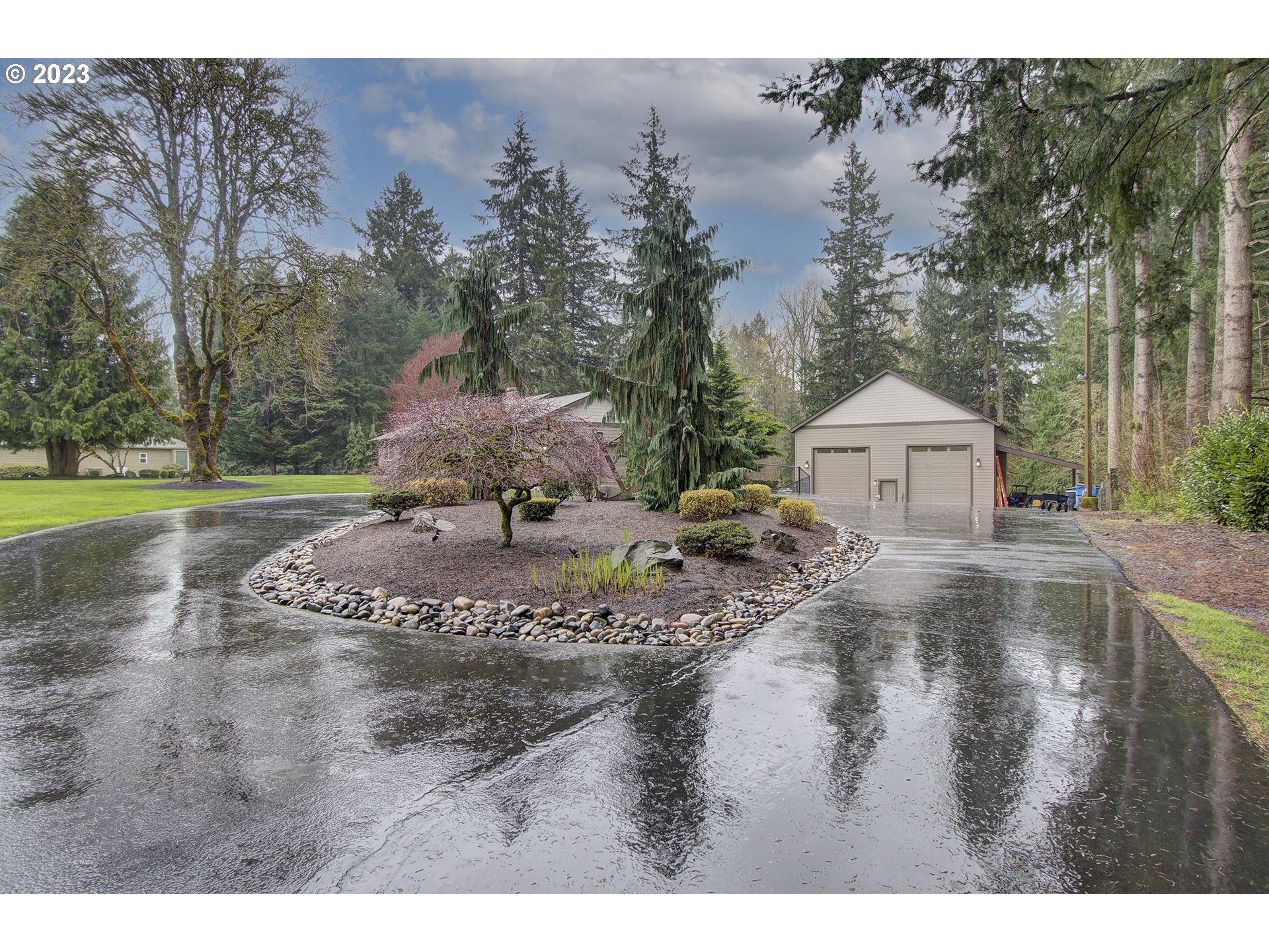 13025 Northeast Prairie Road Brush Prairie, WA 98606 - Photo 3 of 47 a front view of a house with garden