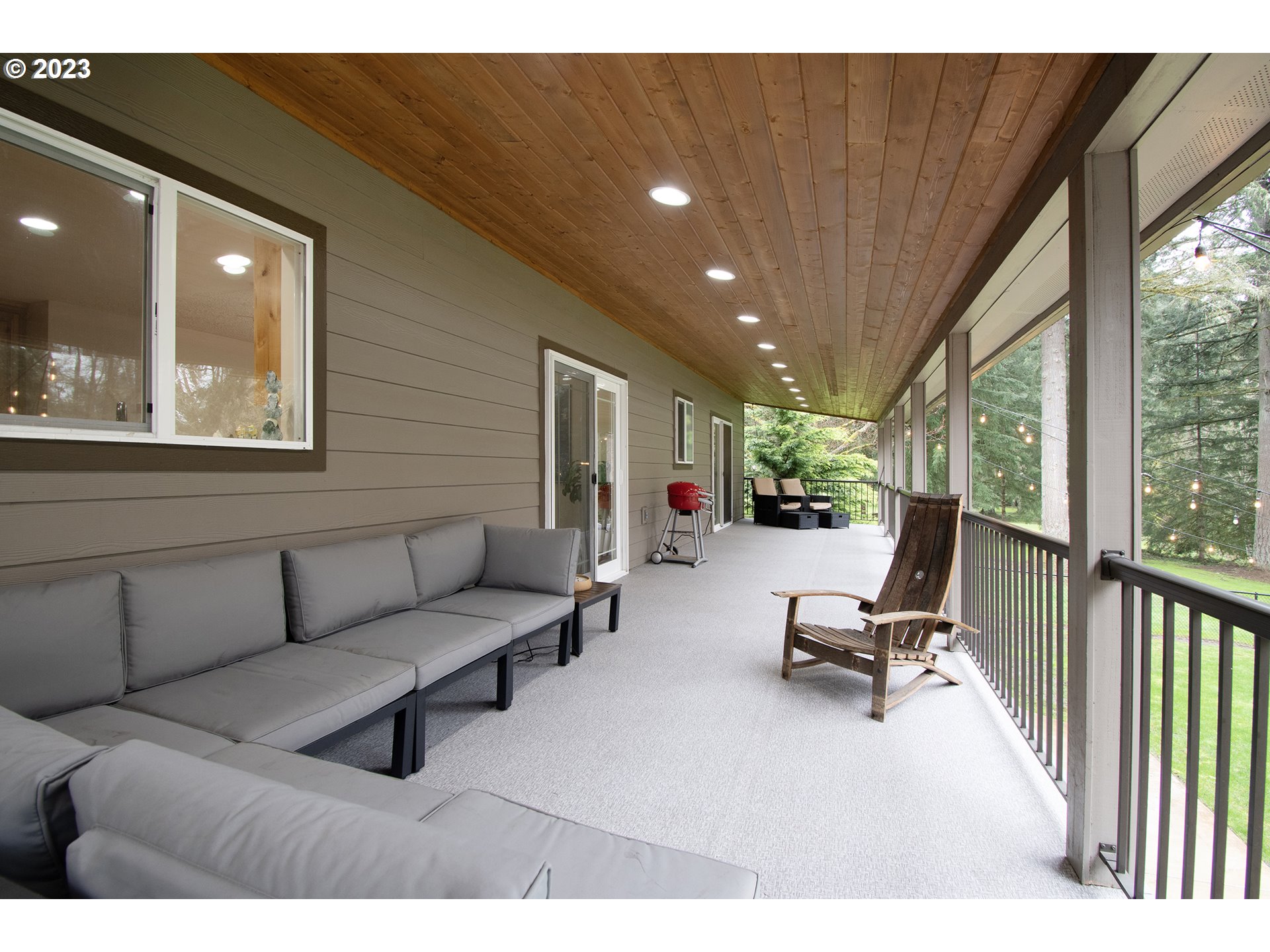 13025 Northeast Prairie Road Brush Prairie, WA 98606 - Photo 35 of 47 a living room with furniture and a large window
