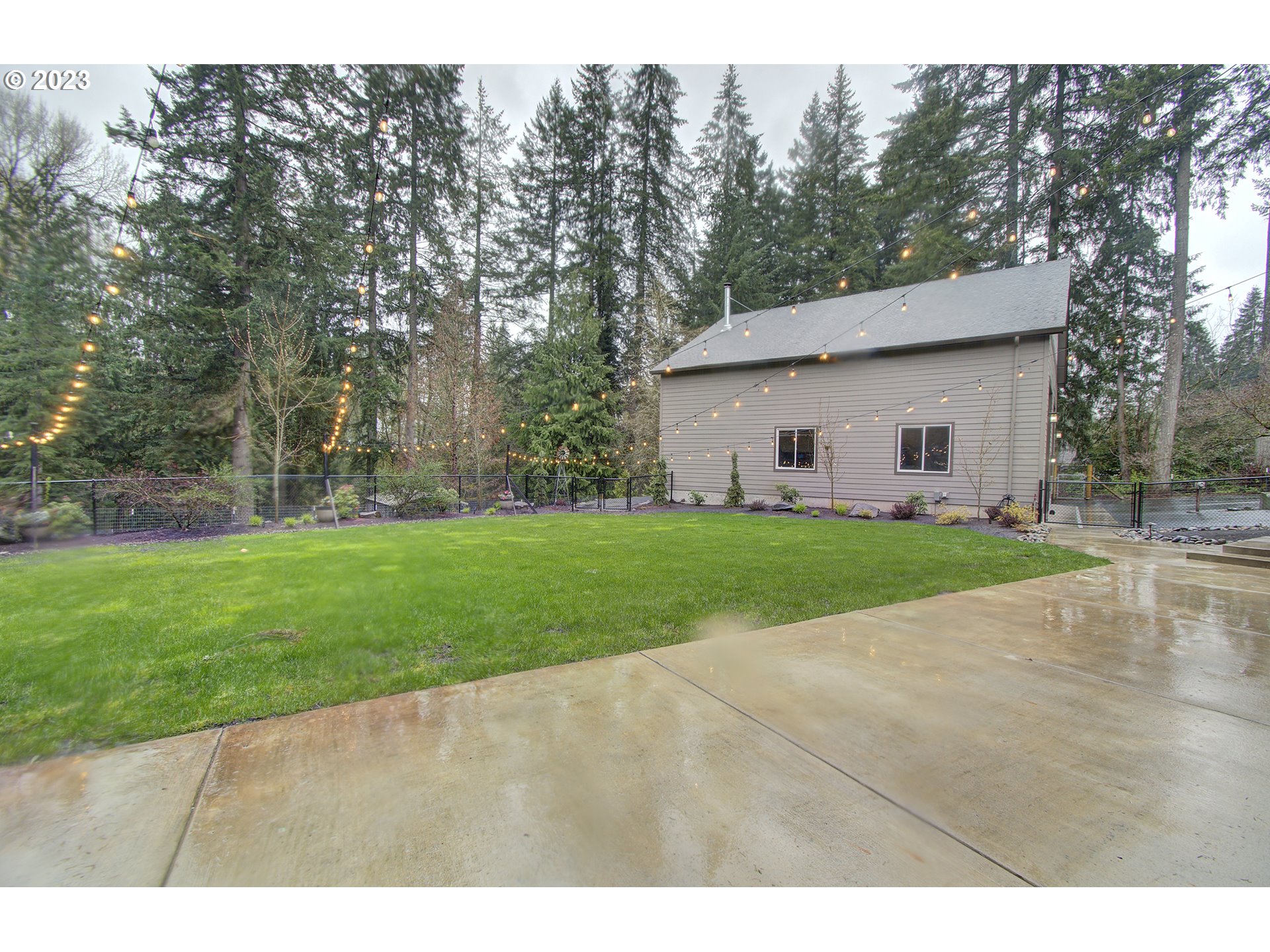 13025 Northeast Prairie Road Brush Prairie, WA 98606 - Photo 40 of 47 a view of a backyard with large trees
