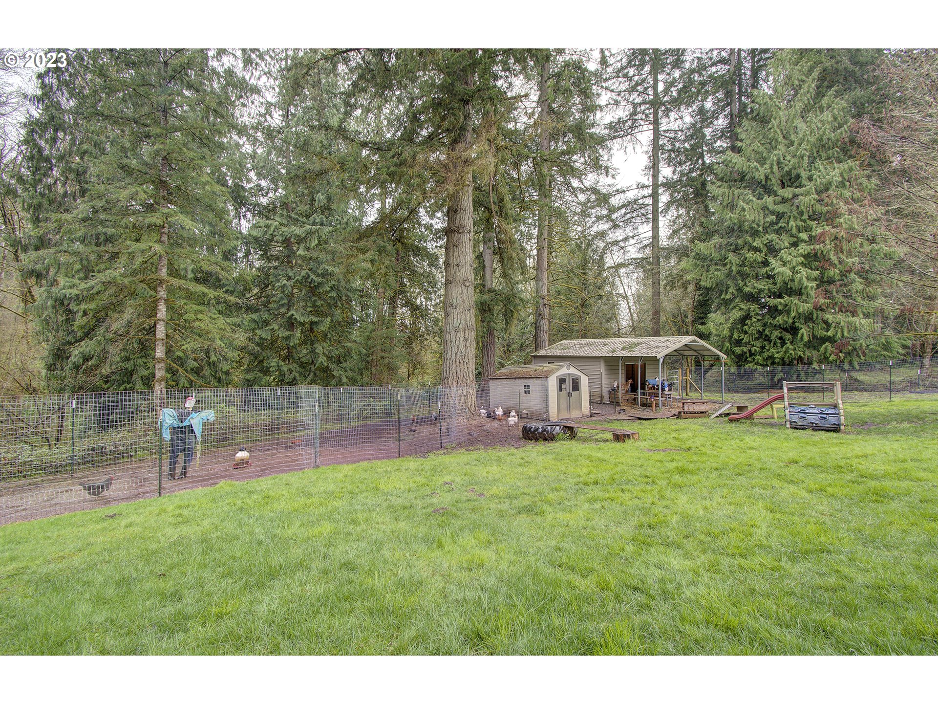 13025 Northeast Prairie Road Brush Prairie, WA 98606 - Photo 42 of 47 a house view with a play ground in front of it