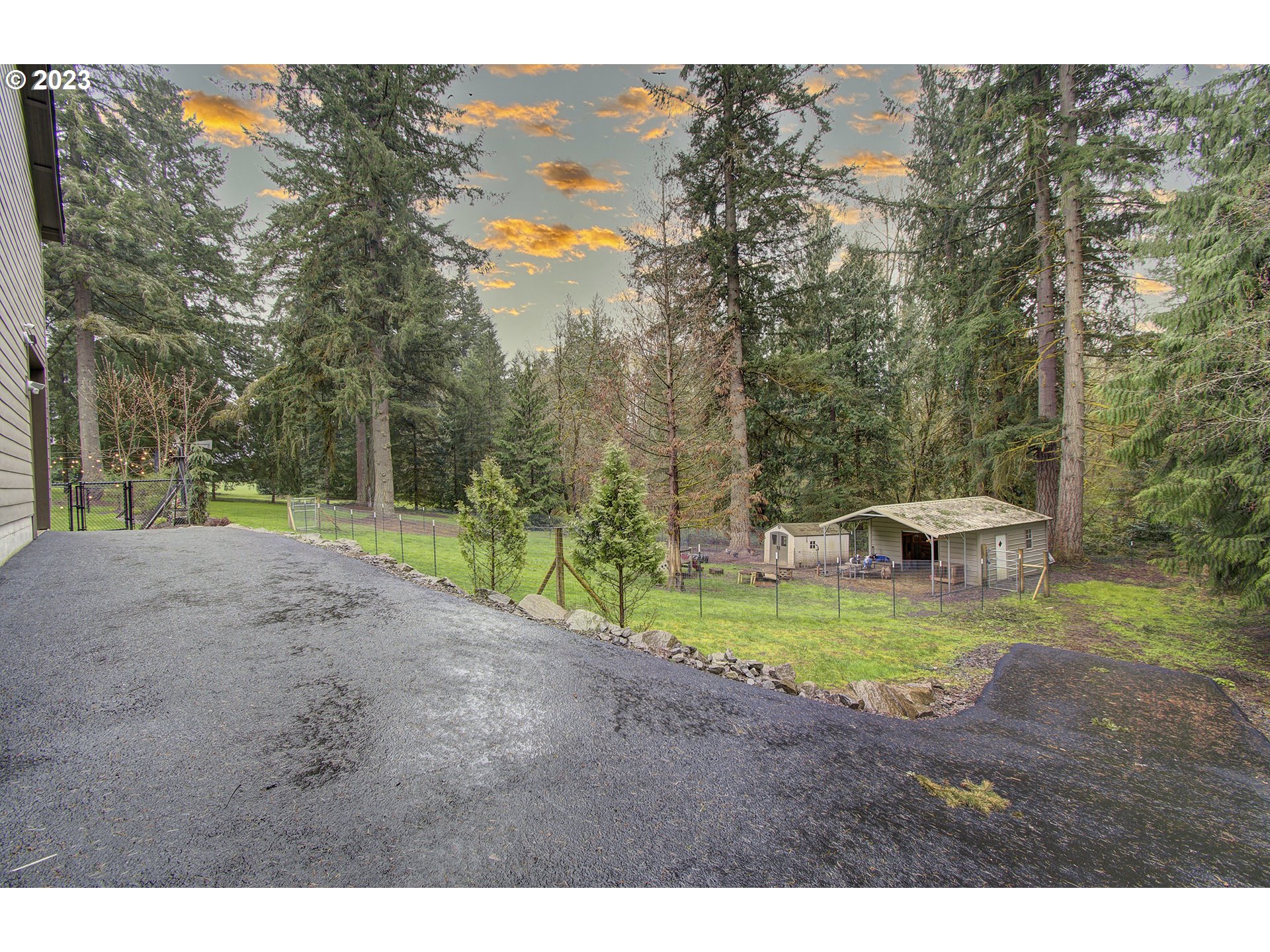 13025 Northeast Prairie Road Brush Prairie, WA 98606 - Photo 44 of 47 a view of a yard with swimming pool