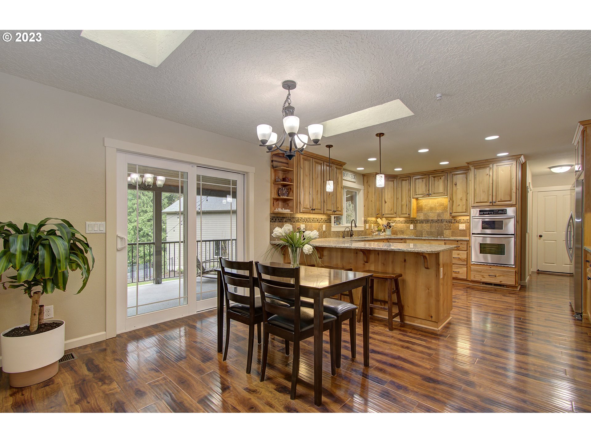 13025 Northeast Prairie Road Brush Prairie, WA 98606 - Photo 7 of 47 a dining room with furniture and window