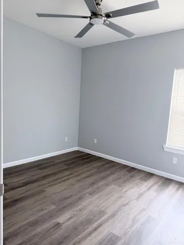 a bathroom with a toilet a sink and bathtub