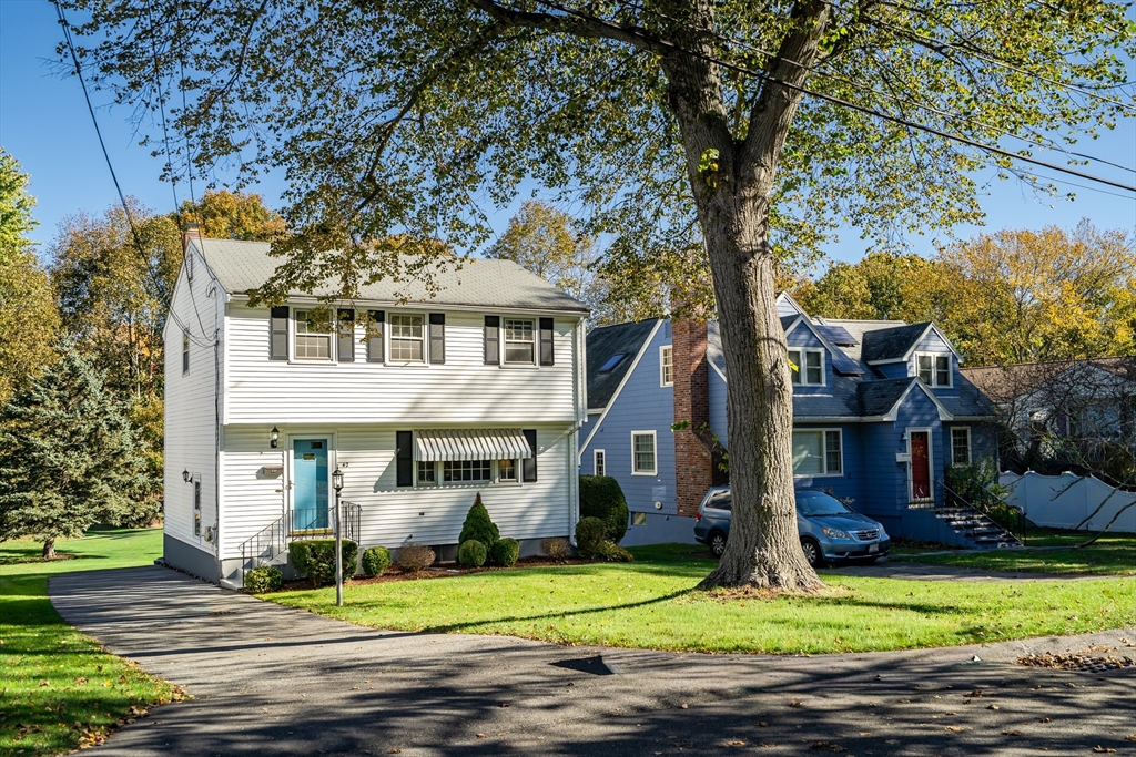42 Grapevine Avenue Lexington, MA 02421 - Photo 1 of 36 a front view of a house with garden