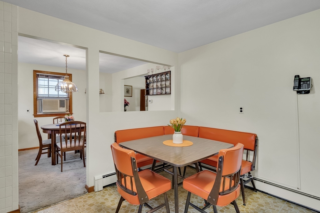 42 Grapevine Avenue Lexington, MA 02421 - Photo 14 of 36 a view of a dining room with furniture