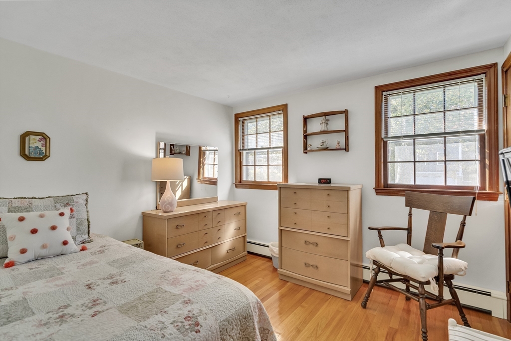 42 Grapevine Avenue Lexington, MA 02421 - Photo 20 of 36 a bed room with a bed and a window