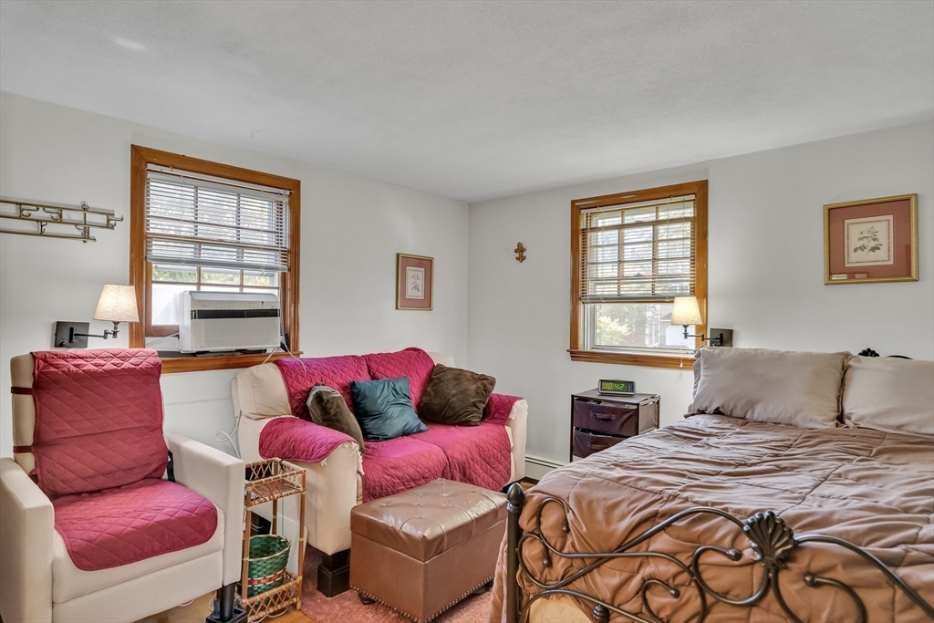 42 Grapevine Avenue Lexington, MA 02421 - Photo 23 of 36 a bedroom with two beds and a window