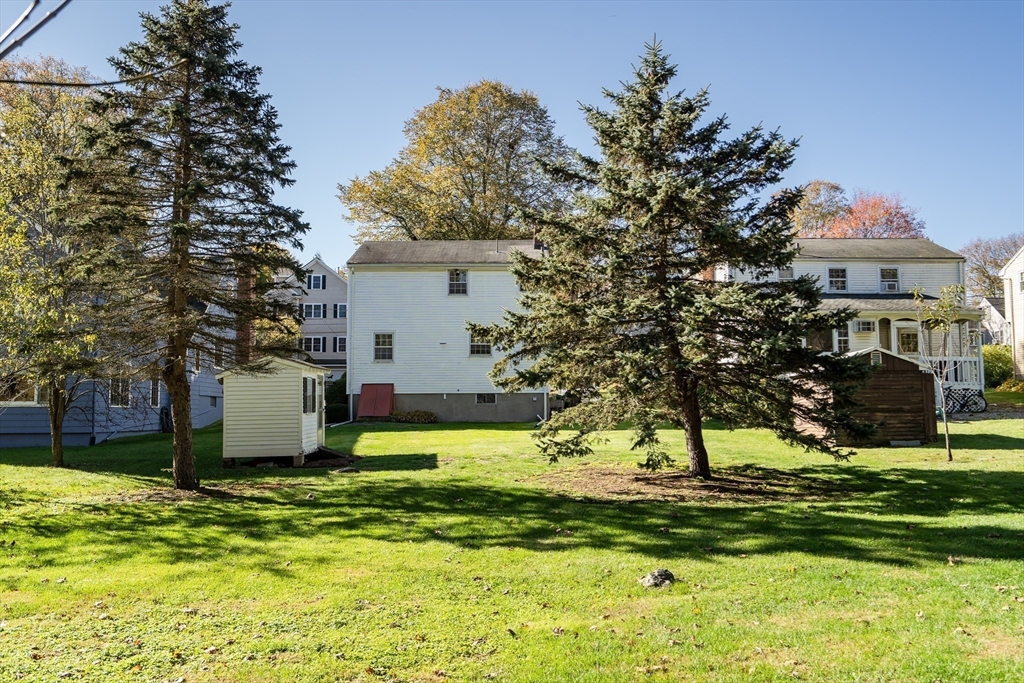 42 Grapevine Avenue Lexington, MA 02421 - Photo 31 of 36 a view of a house with a yard and a tree
