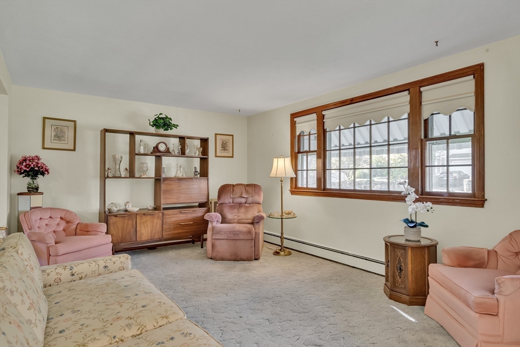 42 Grapevine Avenue Lexington, MA 02421 - Photo 6 of 36 a room with furniture and a window