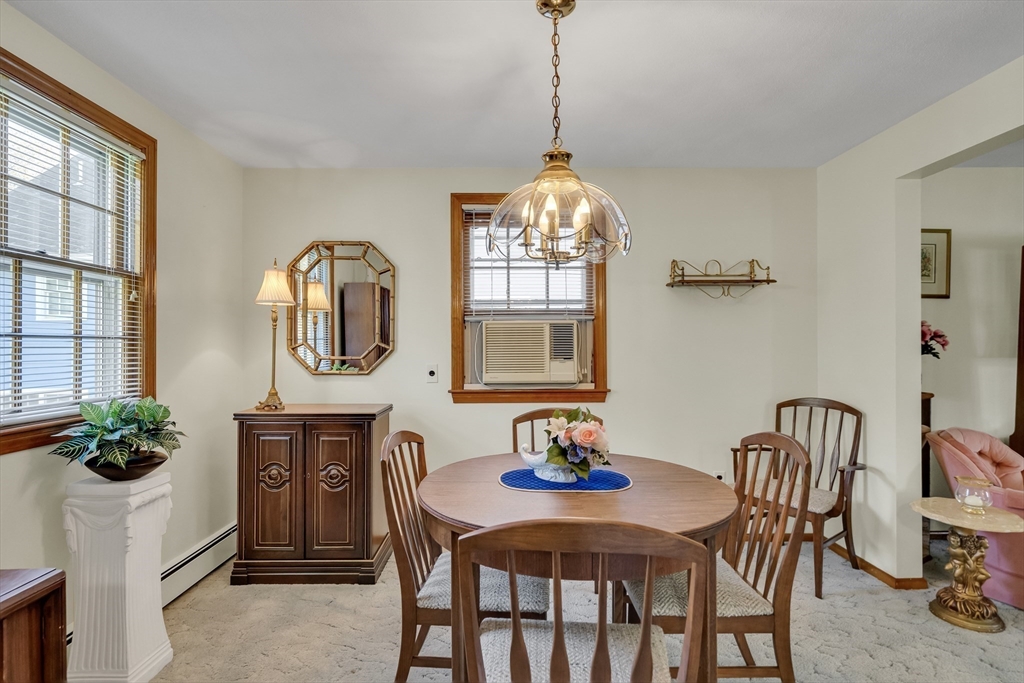 42 Grapevine Avenue Lexington, MA 02421 - Photo 10 of 36 a view of a dining room with furniture window and outside view