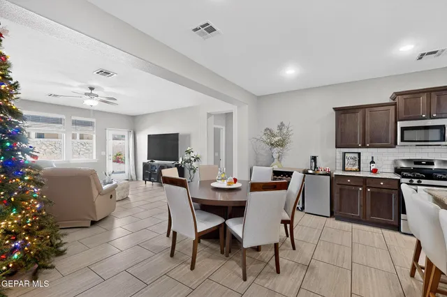 a view of a dining room with furniture
