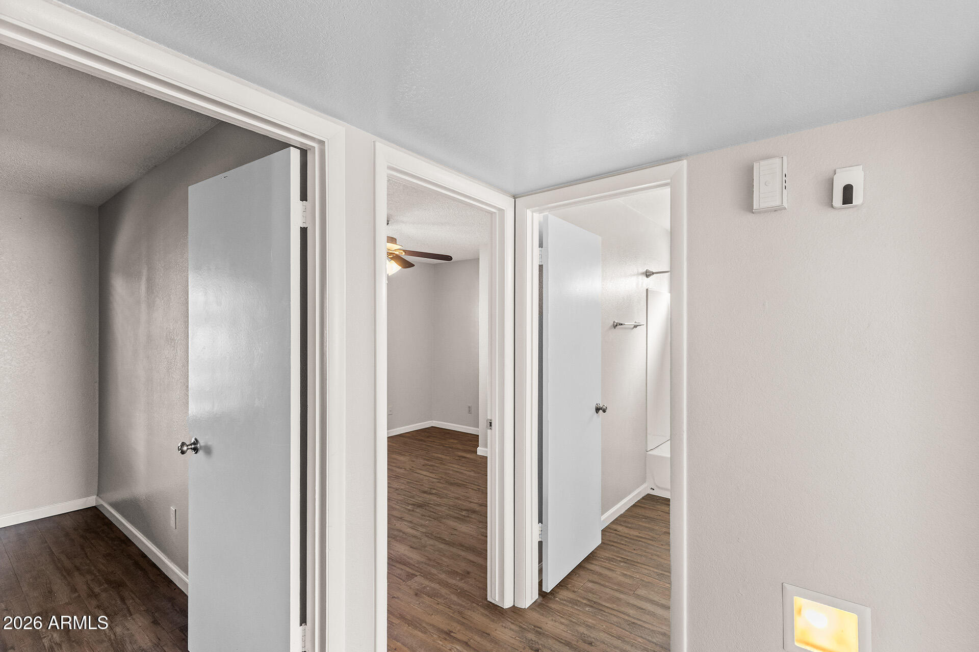 7267 West Charter Oak Road Peoria, AZ 85381 - Photo 26 of 45 a view of hallway with wooden floor