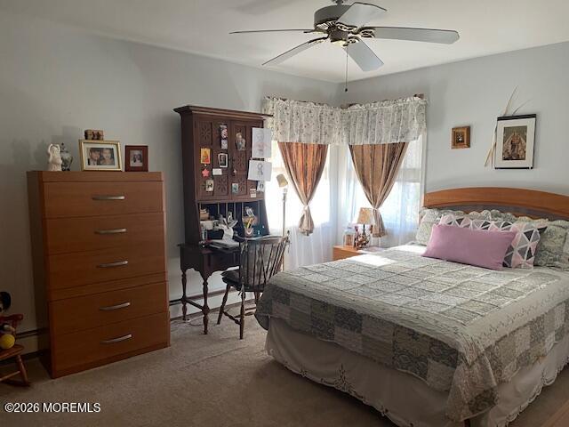 154 Davenport Road Toms River, NJ 08757 - Photo 13 of 23 a bedroom with a bed and a chandelier