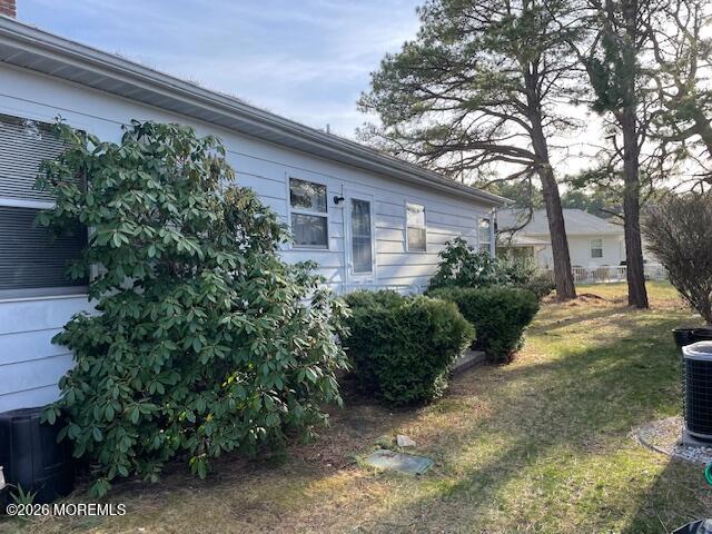 154 Davenport Road Toms River, NJ 08757 - Photo 19 of 23 a backyard of a house with plants and trees