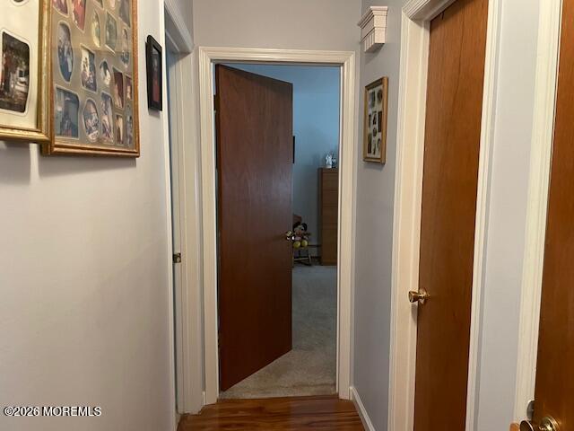 154 Davenport Road Toms River, NJ 08757 - Photo 9 of 23 a view of a hallway with paintings on the wall
