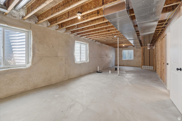 730 West 500 North Smithfield, UT 84335 - Photo 25 of 46 Unfinished basement space featuring exposed wood joists and concrete flooring