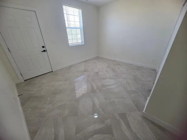 an empty room with windows