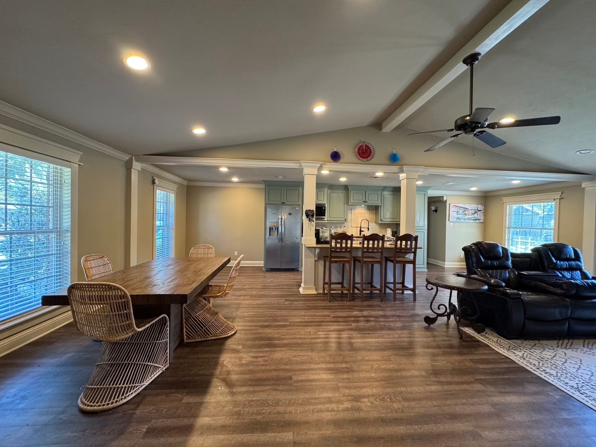 114 Elmwood Street Huntsville, TX 77320 - Photo 9 of 18 a room with lots of furniture and wooden floors