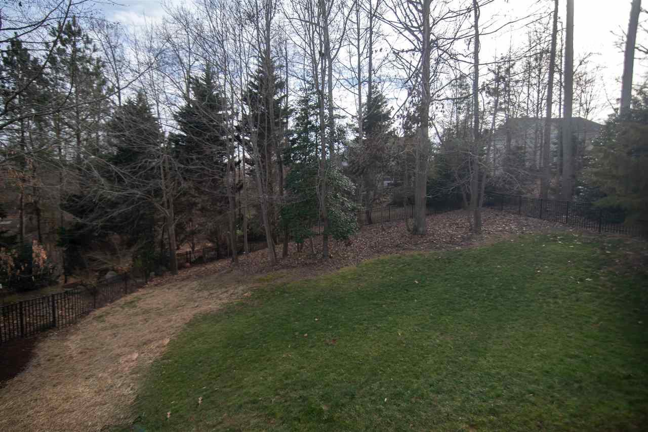 9311 Tabriz Point Raleigh, NC 27614 - Photo 24 of 25 The fully fenced back yard will let pets and children play while you have peace of mind! Back Yard