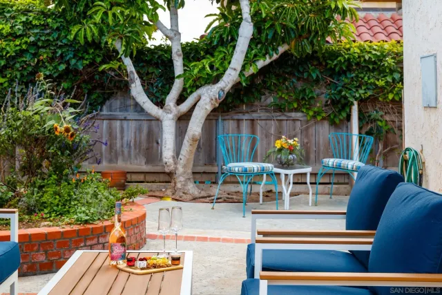 a view of house with outdoor seating space
