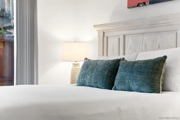 a living room with a couch and a window