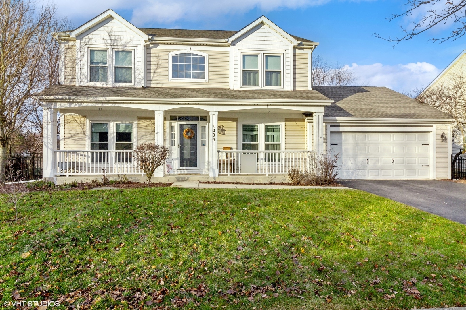 1004 Vineyard Lane Aurora, IL 60502 - Photo 1 of 24 front view of a house with a yard