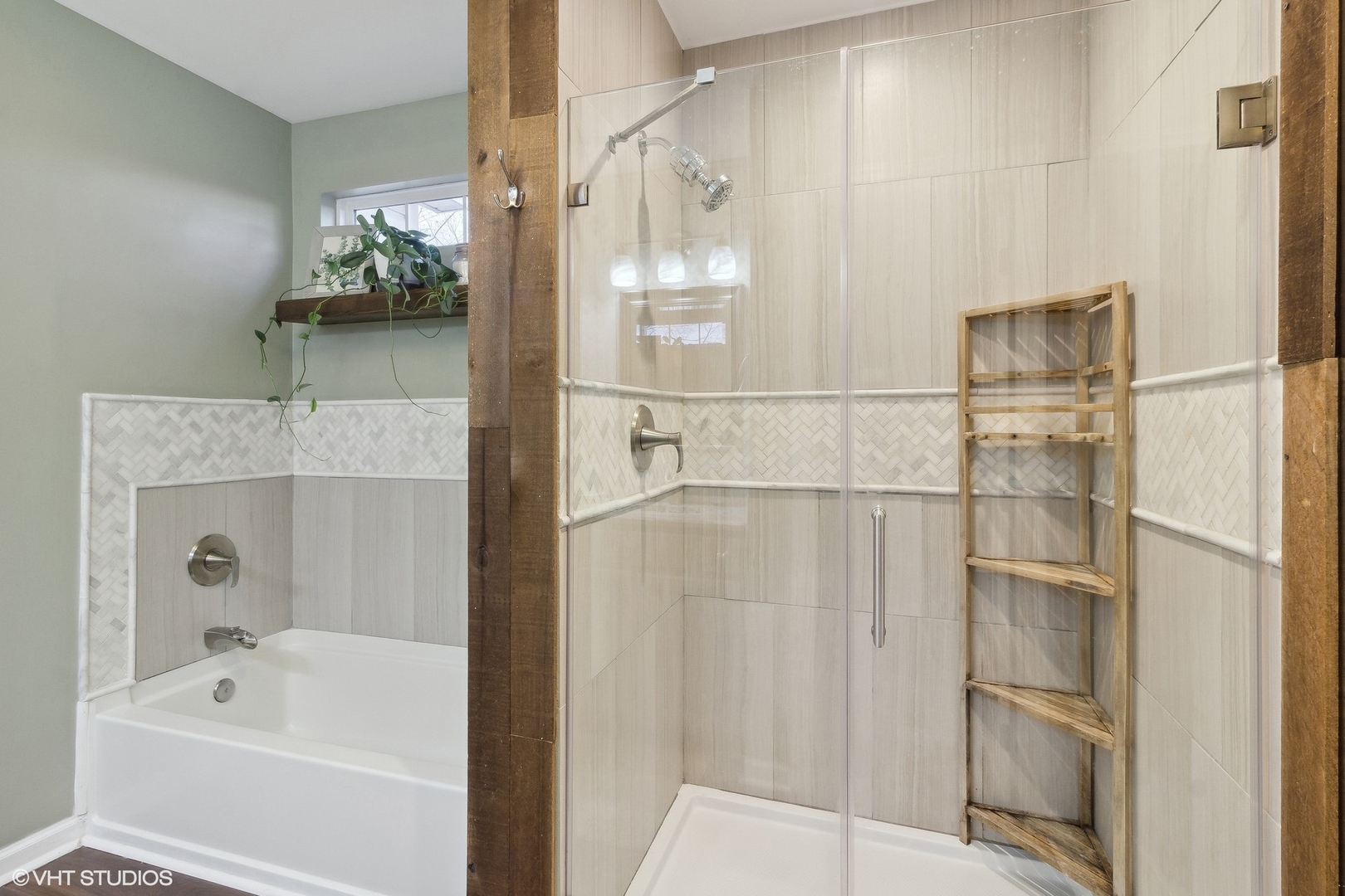 1004 Vineyard Lane Aurora, IL 60502 - Photo 12 of 24 a bathroom with a bathtub and a shower