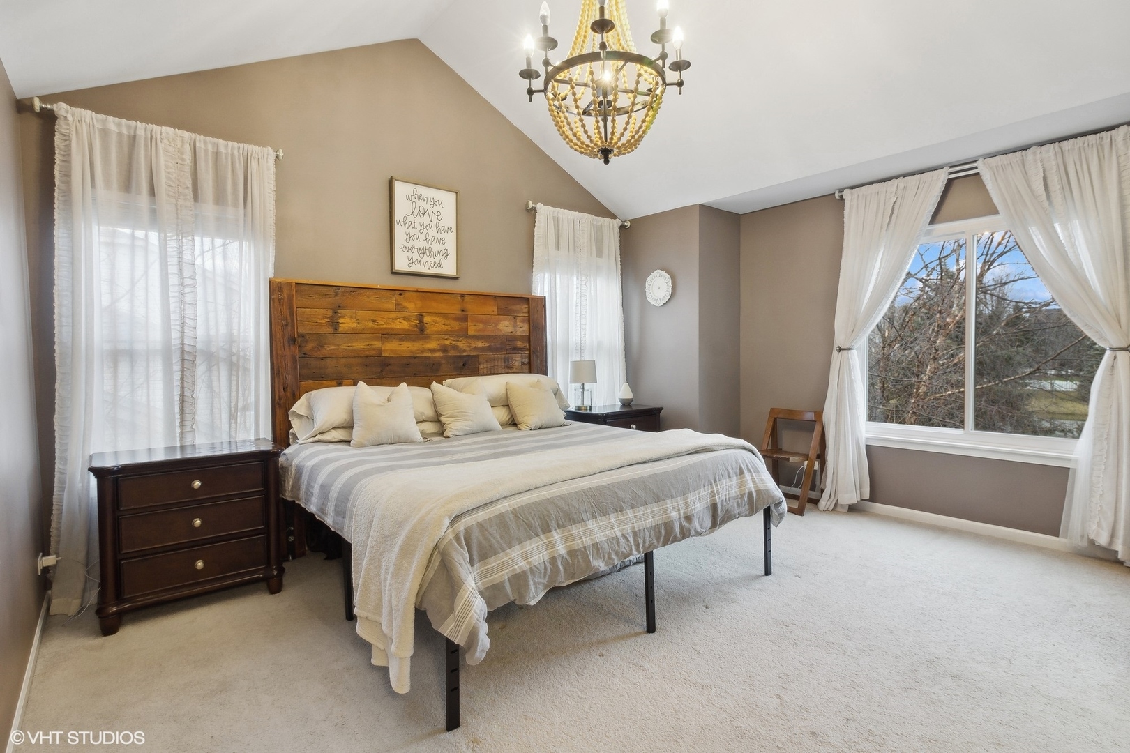 1004 Vineyard Lane Aurora, IL 60502 - Photo 10 of 24 a bed room with a bed and a large window