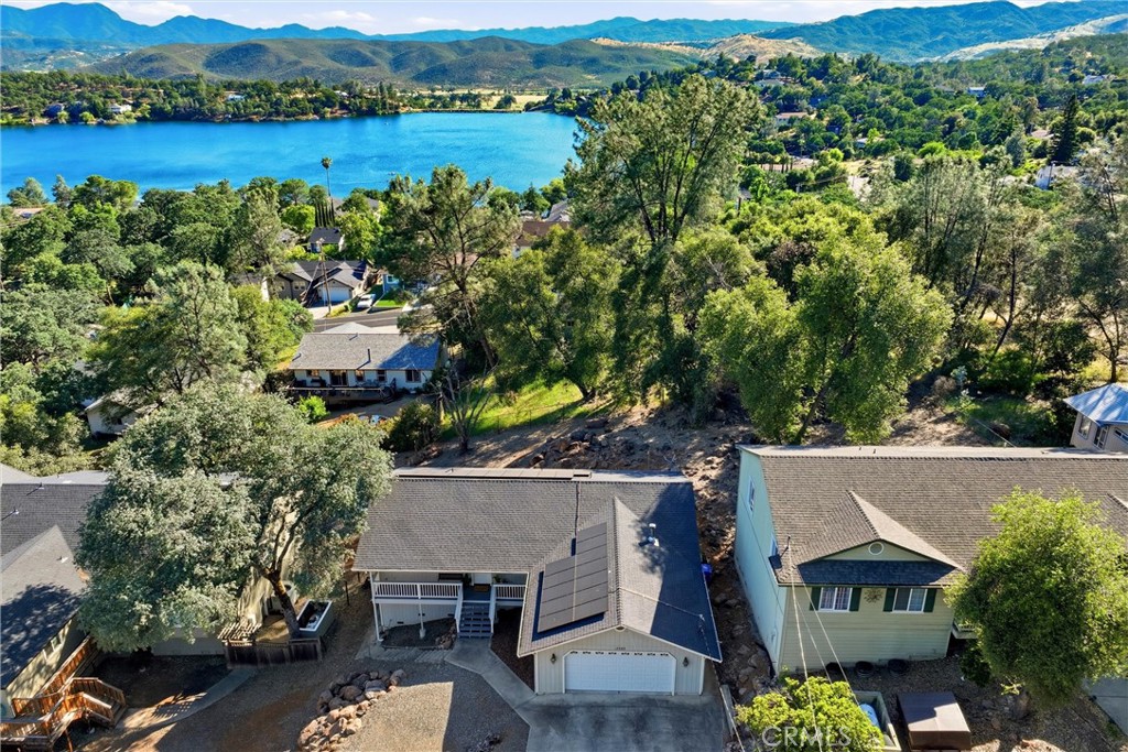 18685 Oak Grove Road Hidden Valley Lake, CA 95467 - Photo 42 of 52 an aerial view of a house with garden space and outdoor seating