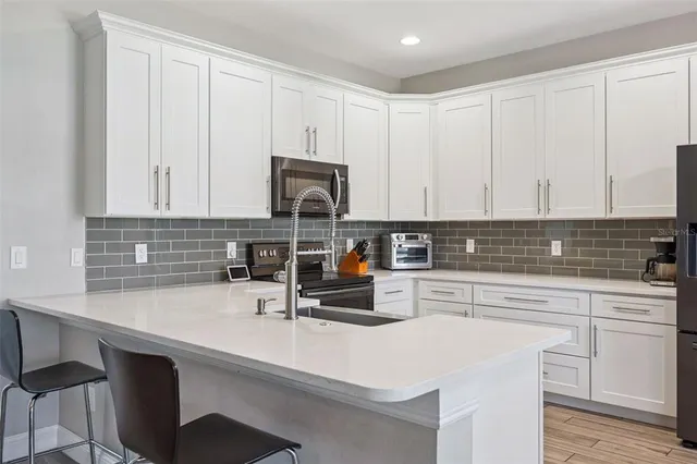 $640,000 | 9319 Marsh Oaks Court, Orlando, FL 32832