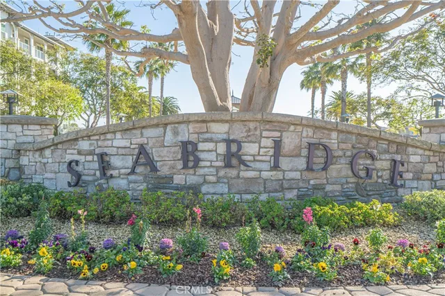 a view of a swimming pool and an ocean view